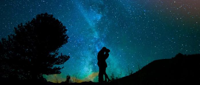 couple against a sky of stars